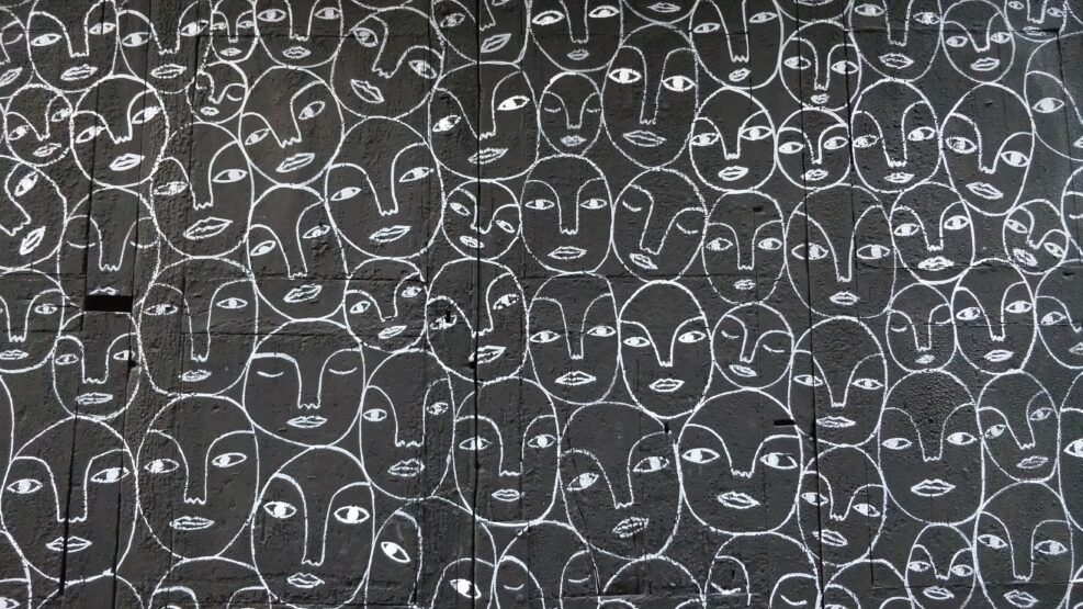 Series of drawn human faces