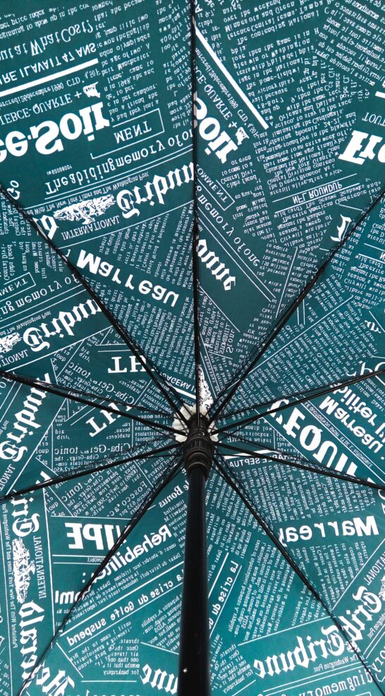 Newspaper clippings used in umbrella design