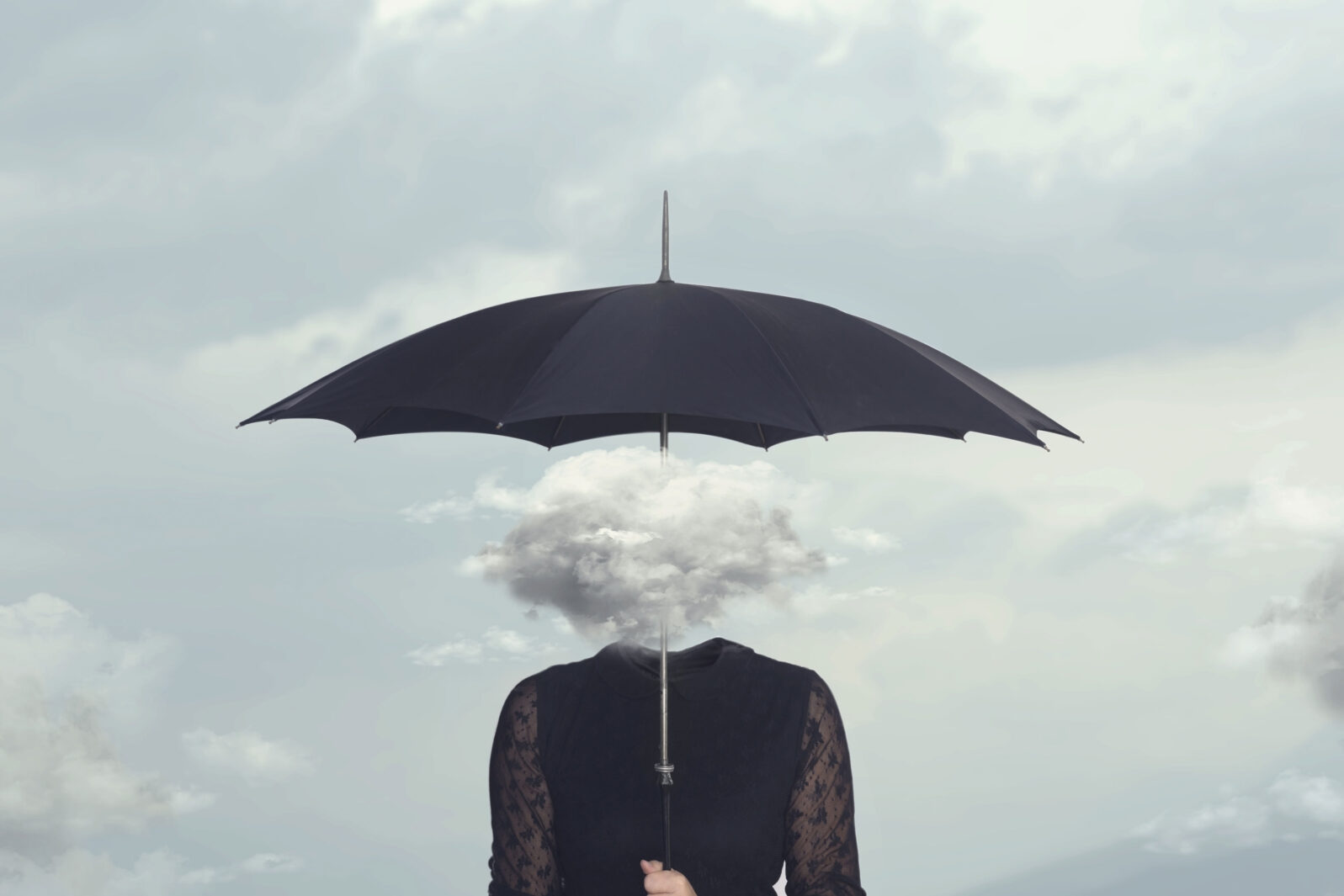 A cloud for a brain under an umbrella