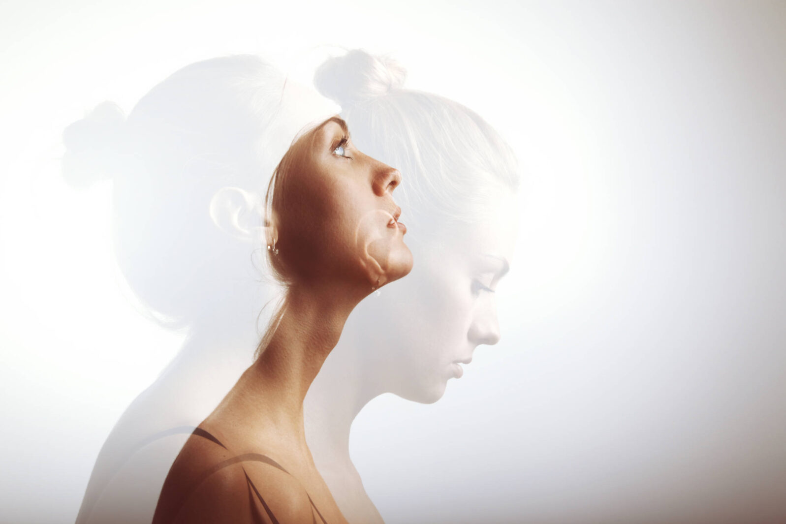 Double exposure portrait of attractive and young girl