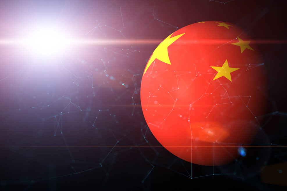 Abstract Chinese flag painted on digital sphere. Futuristic network cyberspace illustration background. View from space. Selective focus used.
