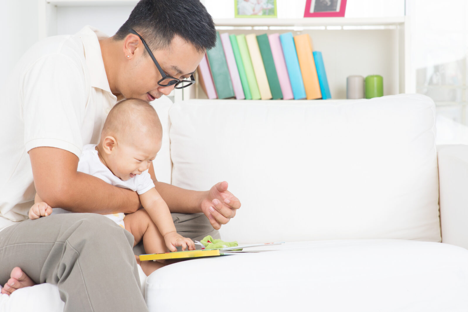 Father and child reading story book