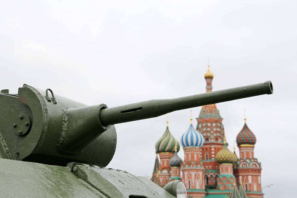 Tank gun on Red square in Moscow on background of St. Basil's Cathedral. Concept for russian military and weapons