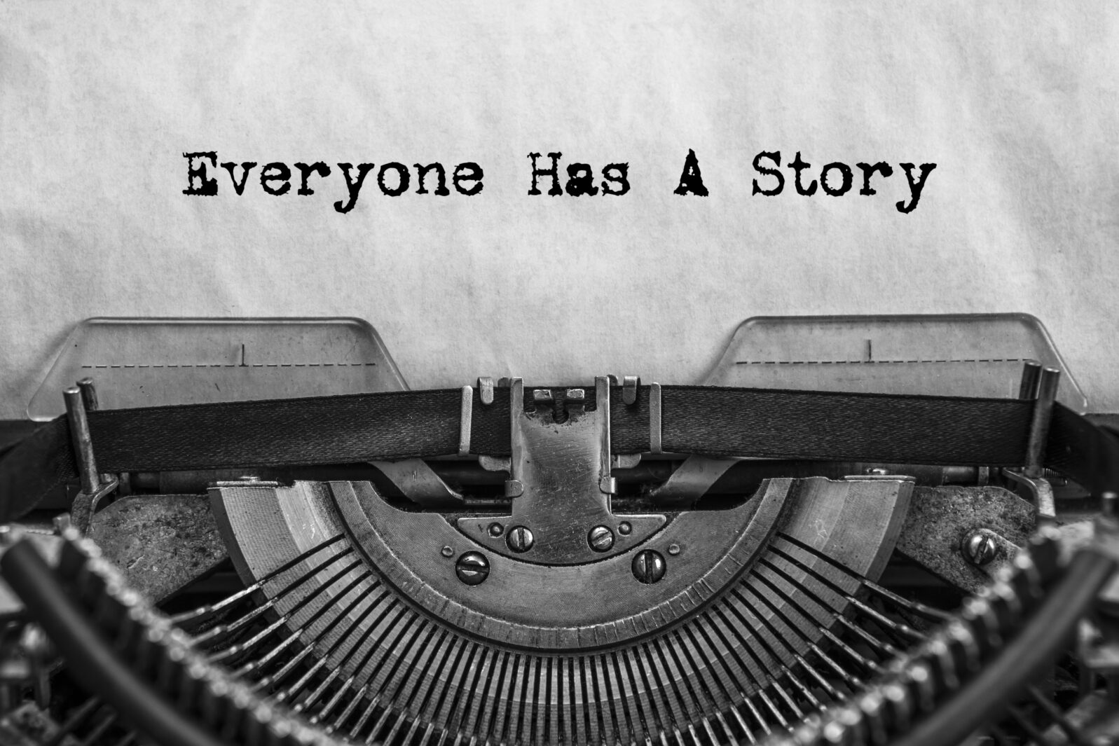 Everyone Has A Story, typed words on a vintage typewriter. old paper. close-up. my history