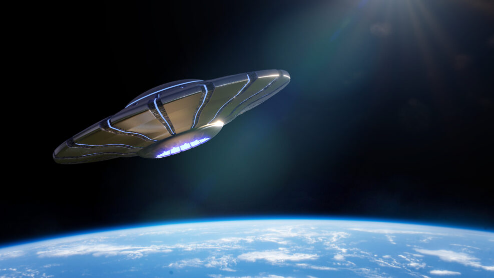 UFO, alien spaceship in orbit of planet Earth, extraterrestrials from outer space in flying saucer
