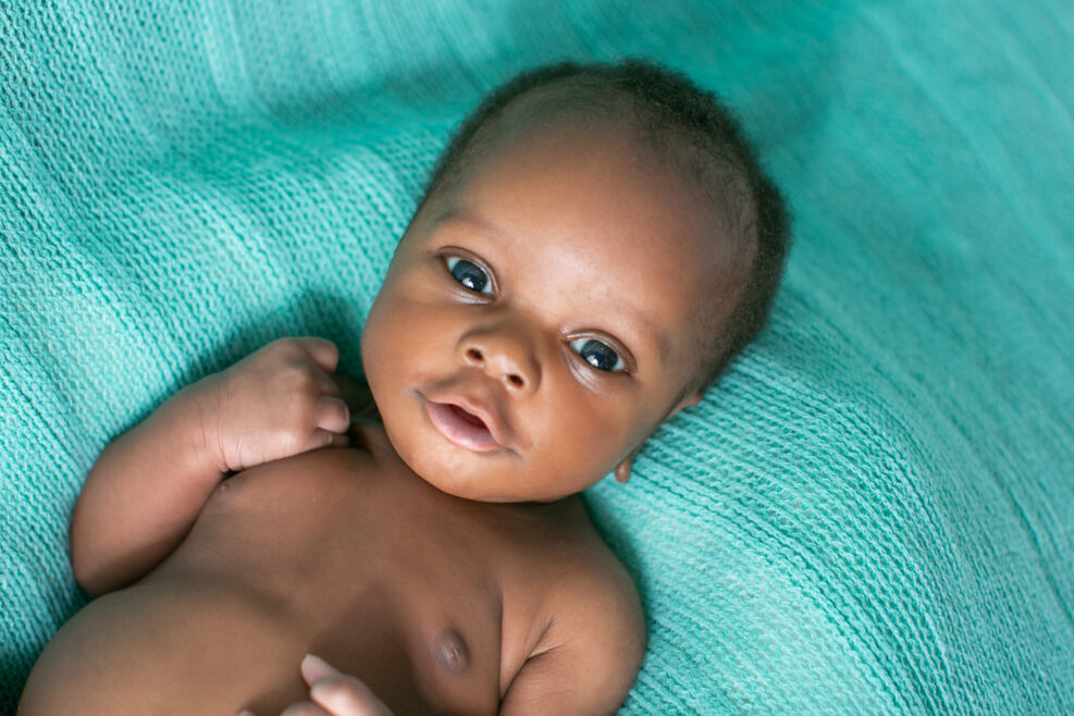 Newborn Alert Baby Boy on Mint Green Blanket