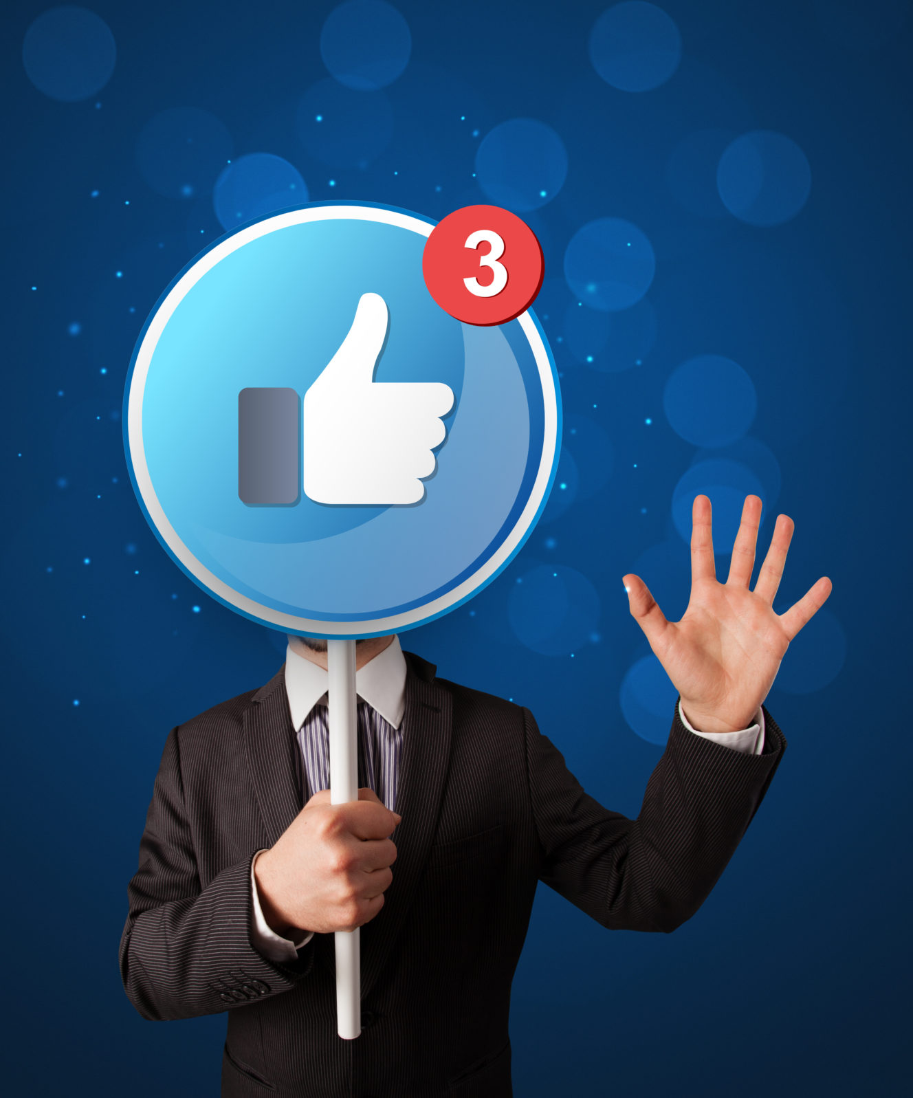 Smart businessman holding round sign with facebook like