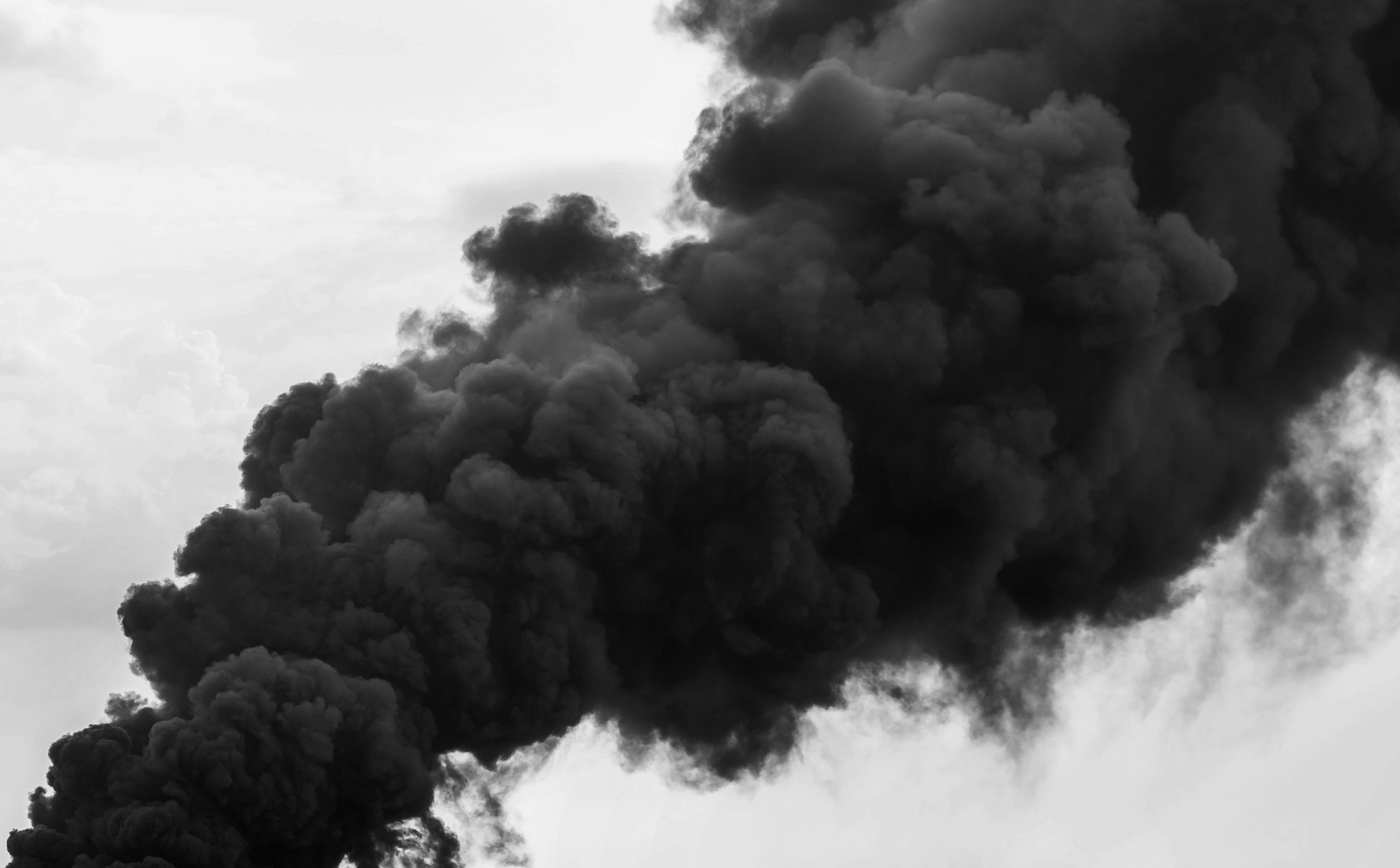 Huge Black Smoke Cloud From Fire Stock Photo, Picture and Royalty