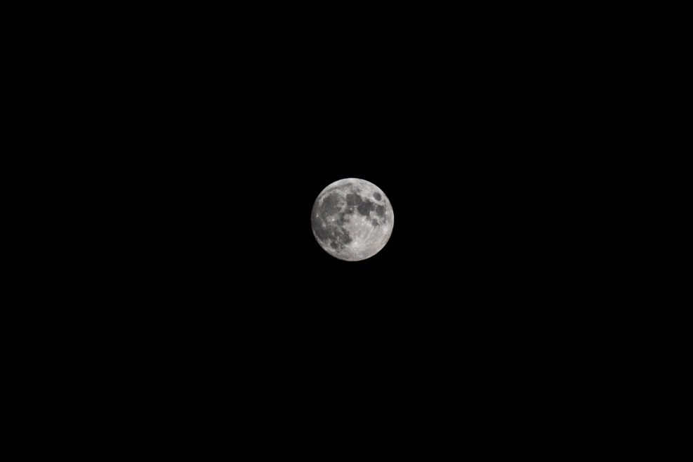 Full moon in a black night sky