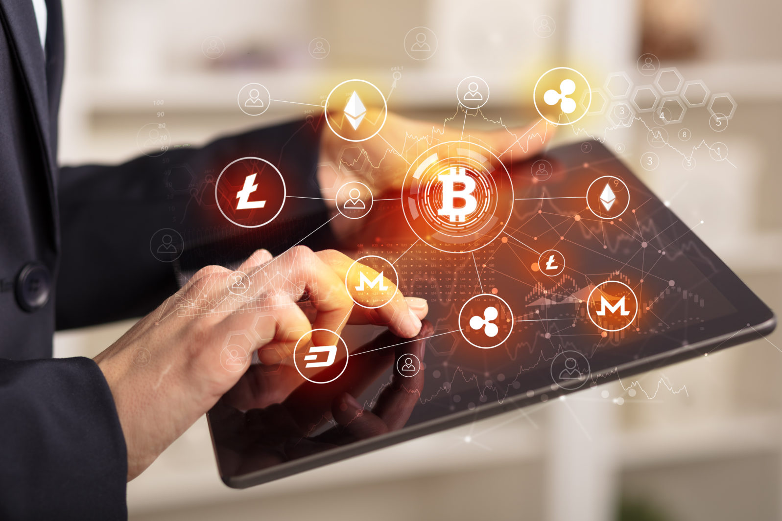 Business woman using tablet with cryptocurrency bitcoin link network concept