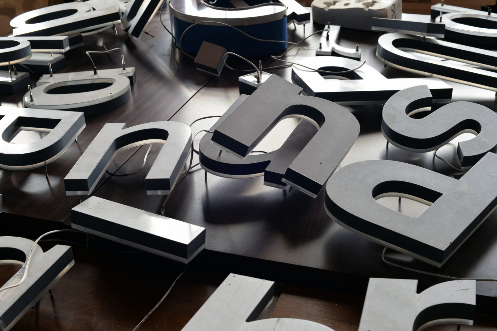 pile of salvage sign letters