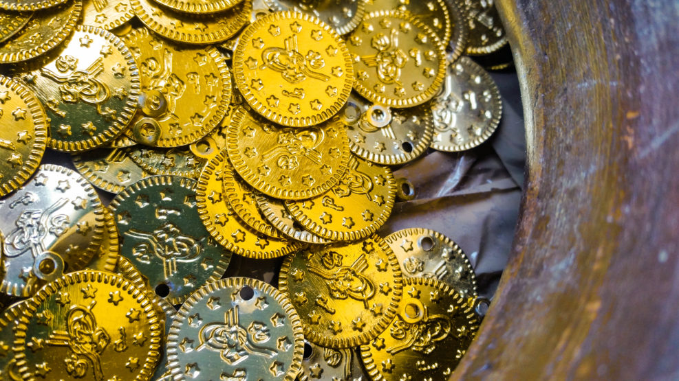 Fake gold and silver coins closeup