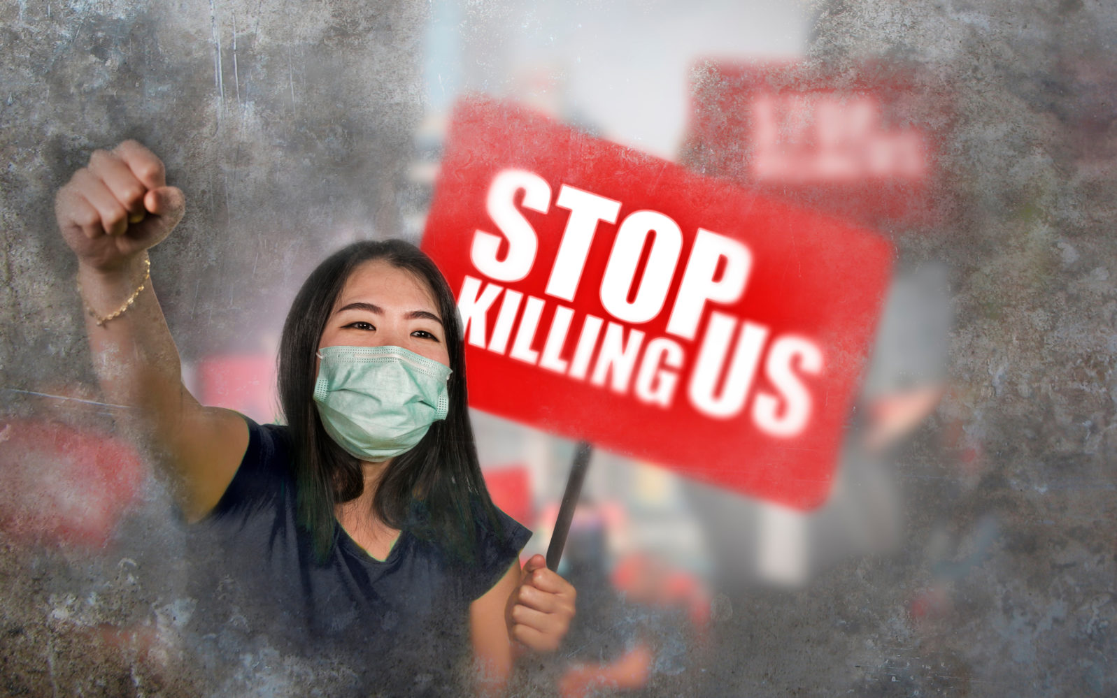 pacifist Asian woman angry and outraged protesting on street demonstration against China abuse standing for freedom and human rights holding Stop Killing Us billboard