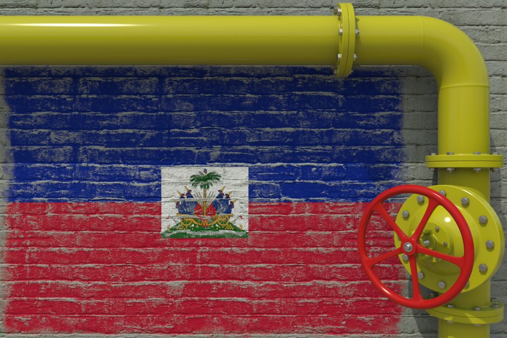 Pipe with valve and flag of Haiti. 3d rendering