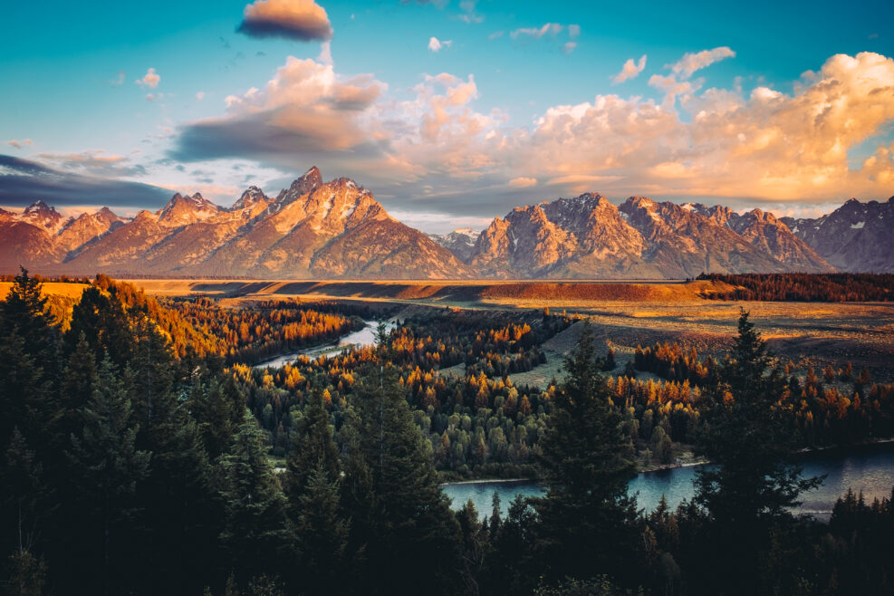 Grand Tetons peak at sunrise with snake river overlook in Wyoming, US