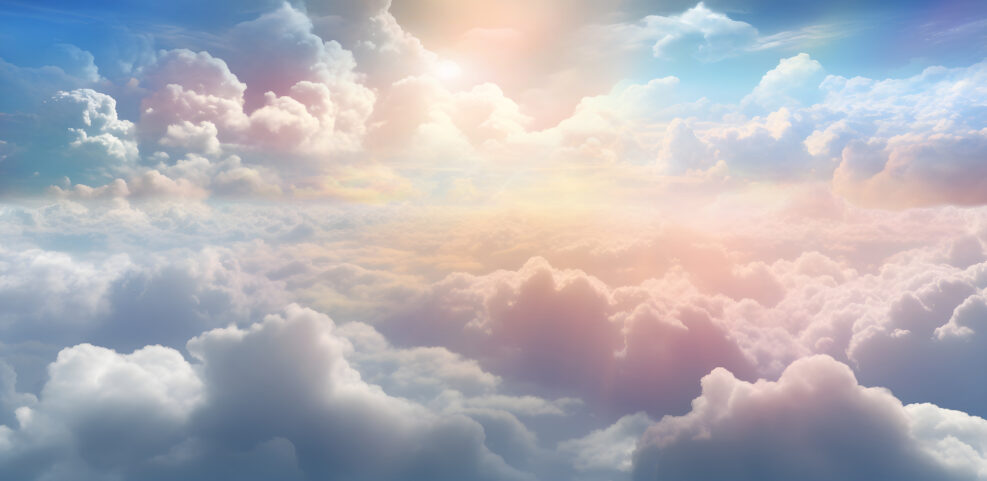 This is exactly what heaven looks like - looking over the top of a blanket of gorgeous pastel coloured fluffy clouds depicting heavenly lansdcape background ideal for a spiritual theme