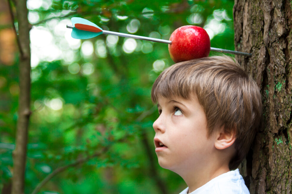 kid with apple on head