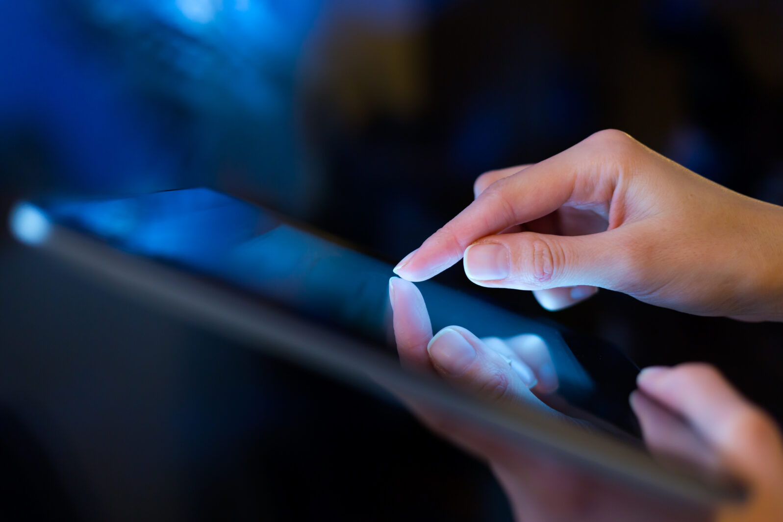 man holding digital tablet, closeup