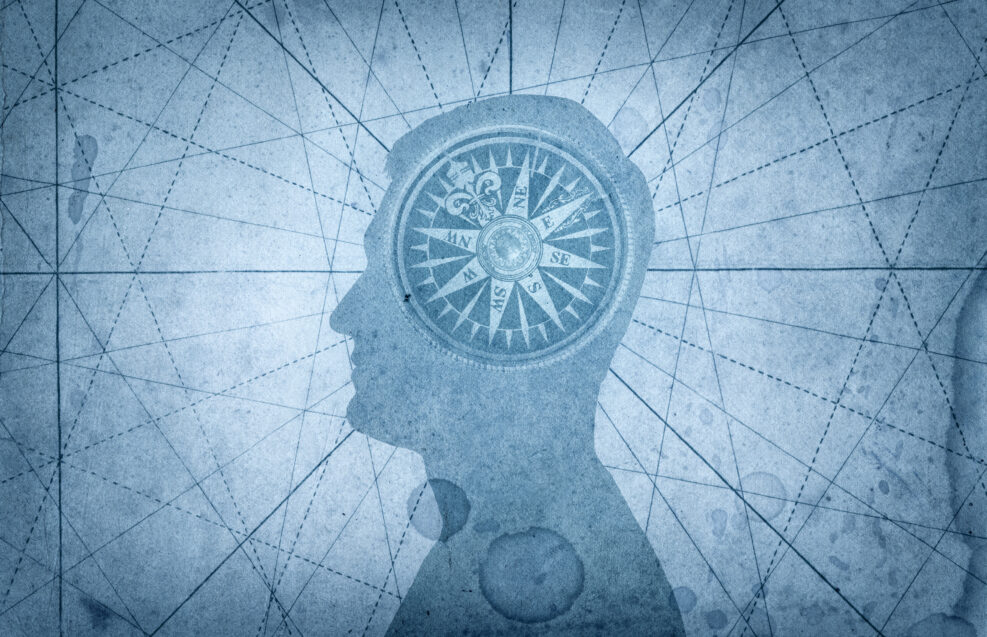 Human head and compass. The concept on the topic of navigation, psychology, morality, etc.