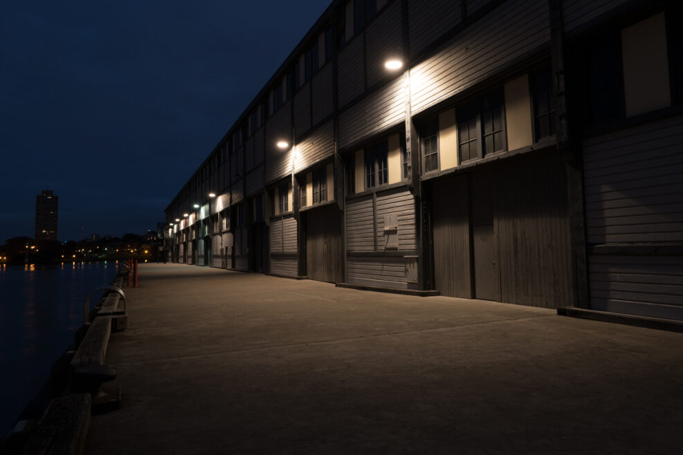 old warehouse on a wharf at night