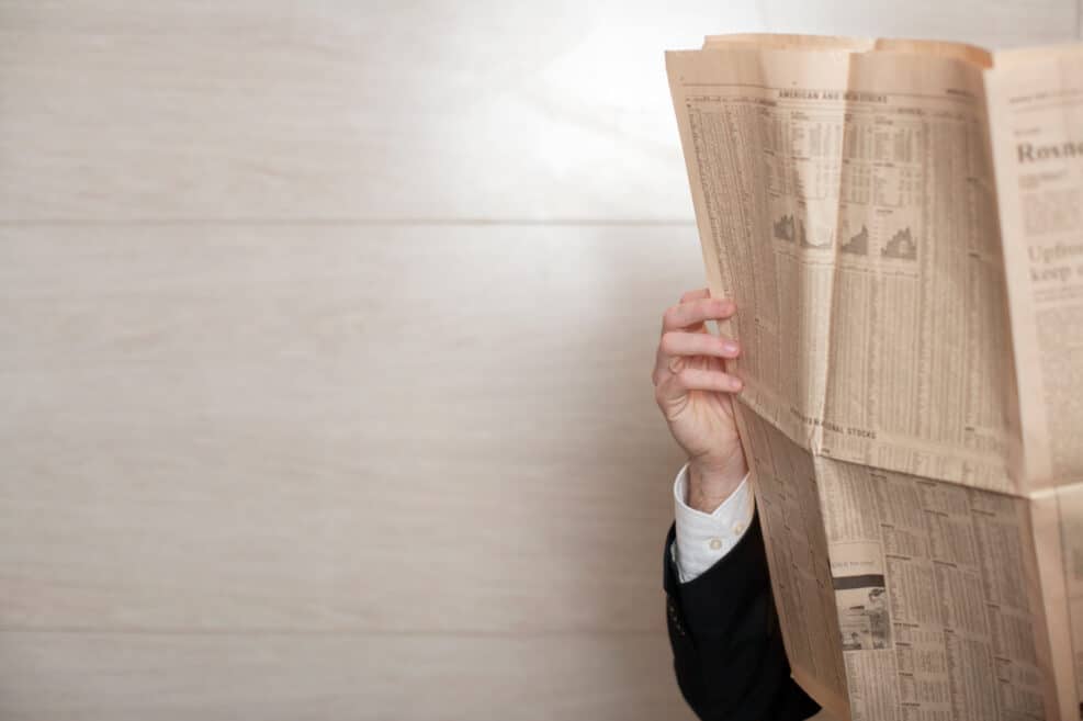 Businessman reading a newspaper