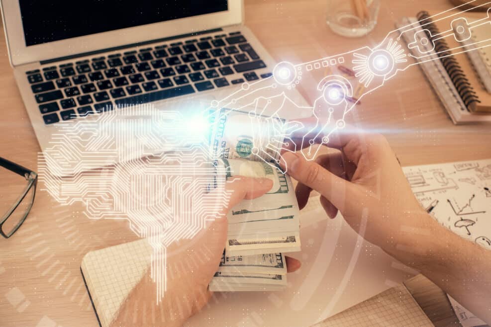 Multi exposure of brain drawing hologram and us dollars bills and man hands. Ai invest concept
