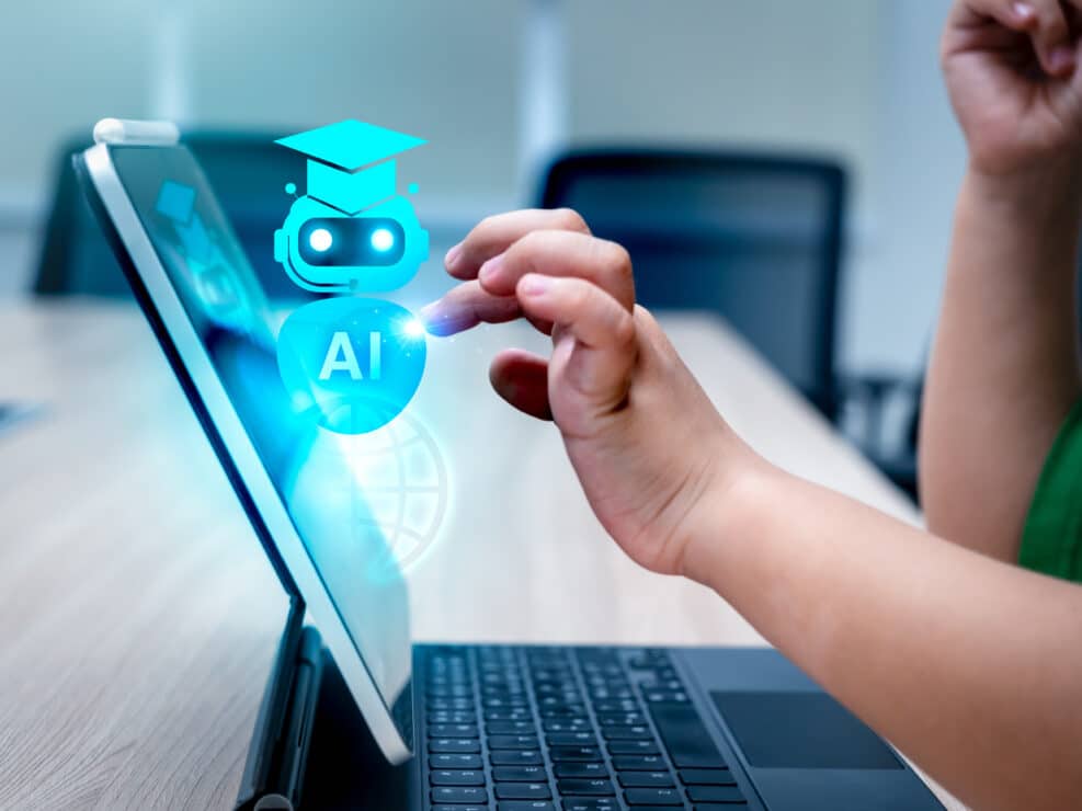 Education, kid learning and training with AI, knowledge and technology concept. Robot hologram in graduation hat showing while child using digital tablet with finger touch on screen, homework school.