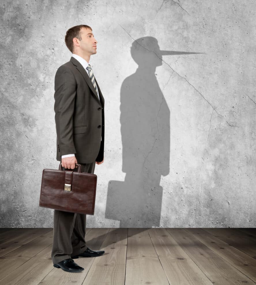 Businessman with long nose