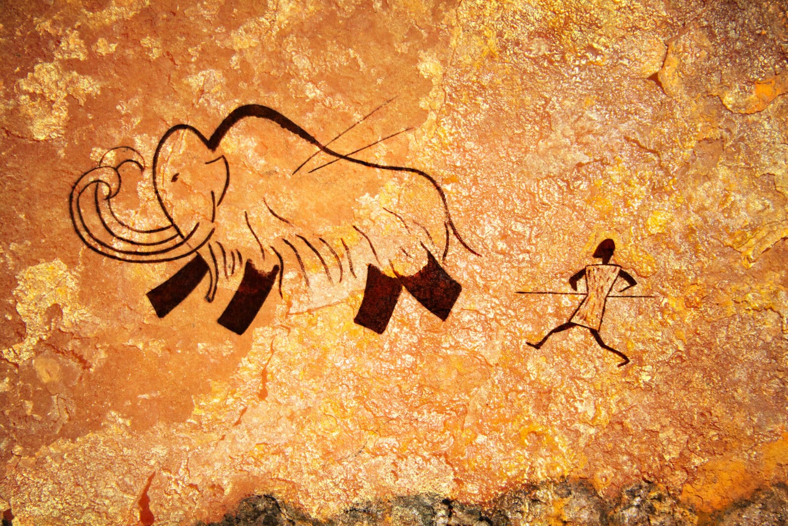 Cave painting of primitive hunt
