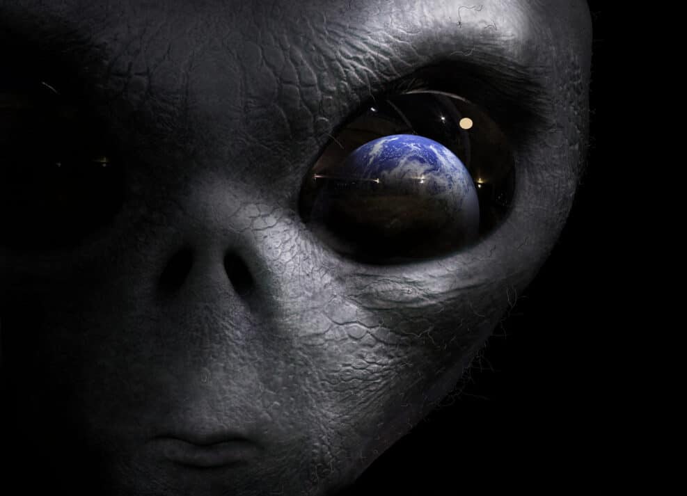 alien looking at the earth