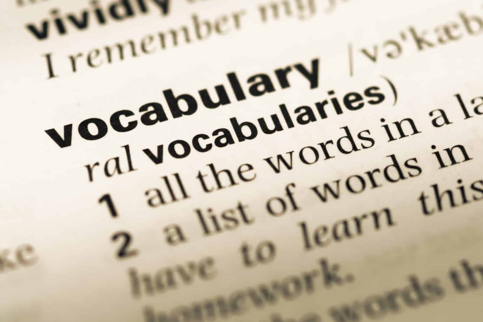 Close up of old English dictionary page with word vocabulary