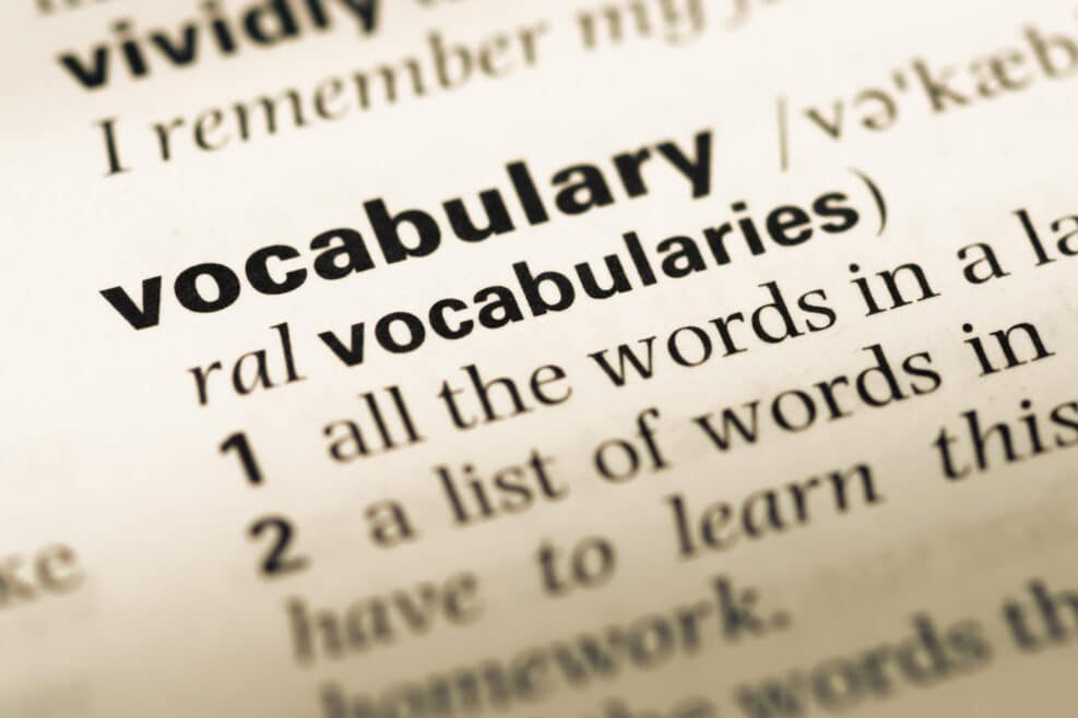 Close up of old English dictionary page with word vocabulary