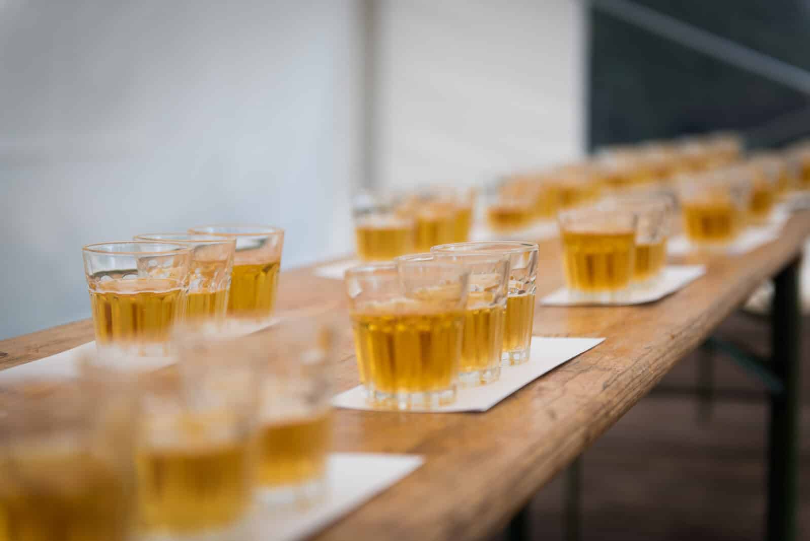 Glasses with stale beer without foam